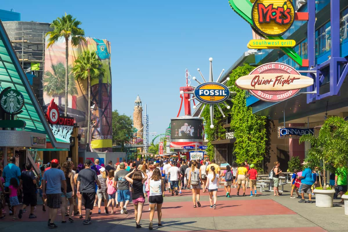 People walking along the CityWalk in Universal Orlando