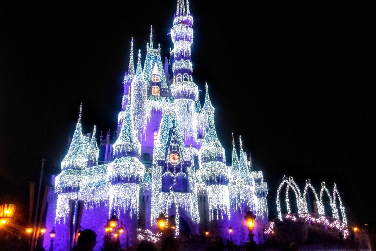 Cinderella's Castle adorned with lights at night