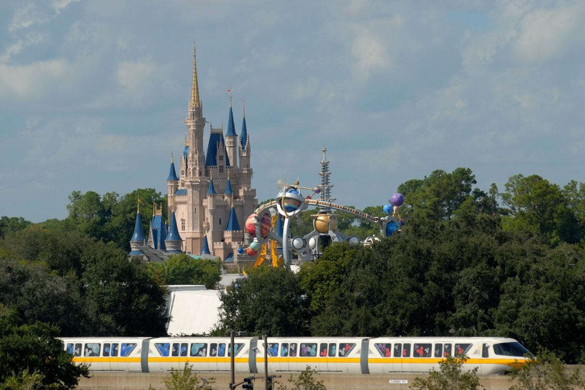Disney World shuttle with the castle in the background