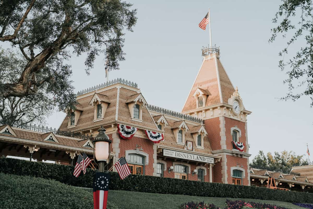 Entrance to Disneyland California decorated with American flags