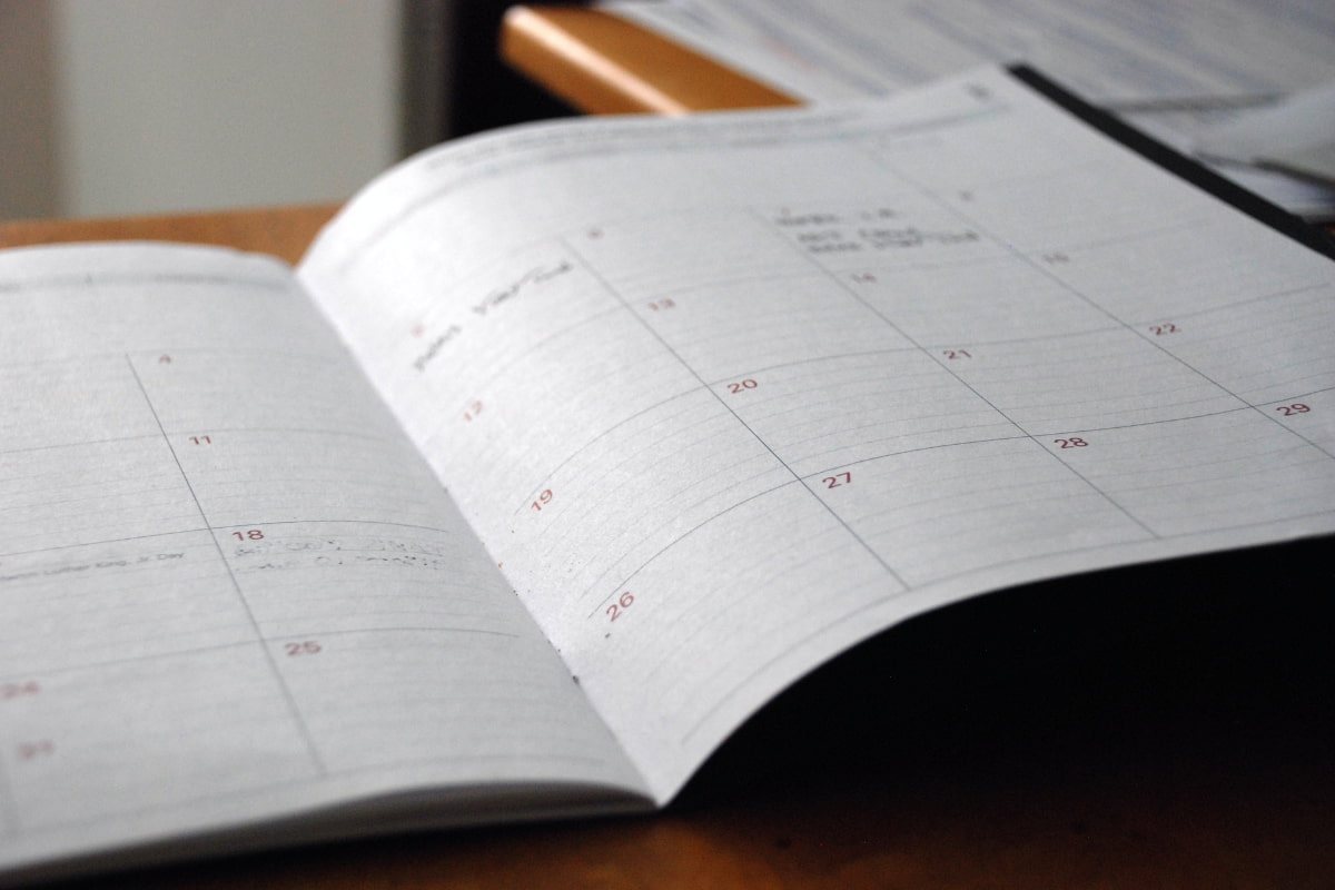 Close up of a planner on a table