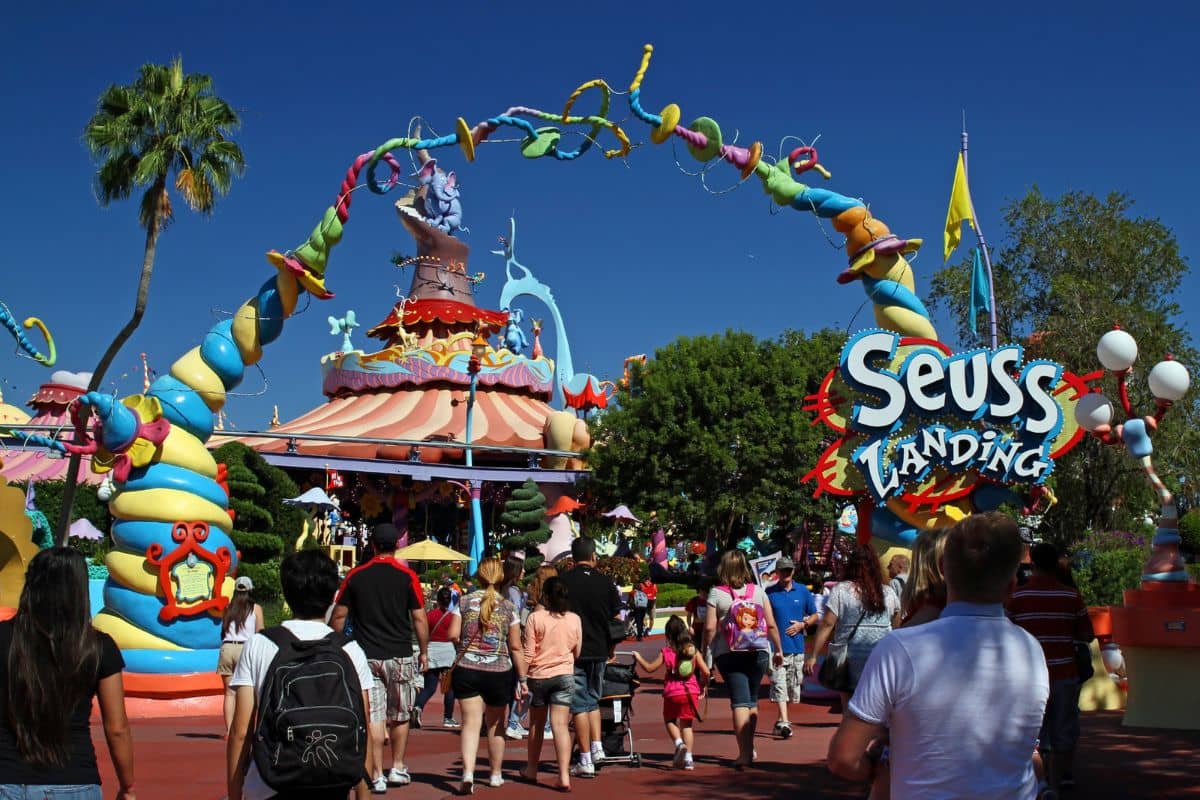 People going through the entrance of Seuss Landing at Universal Islands of Adventure