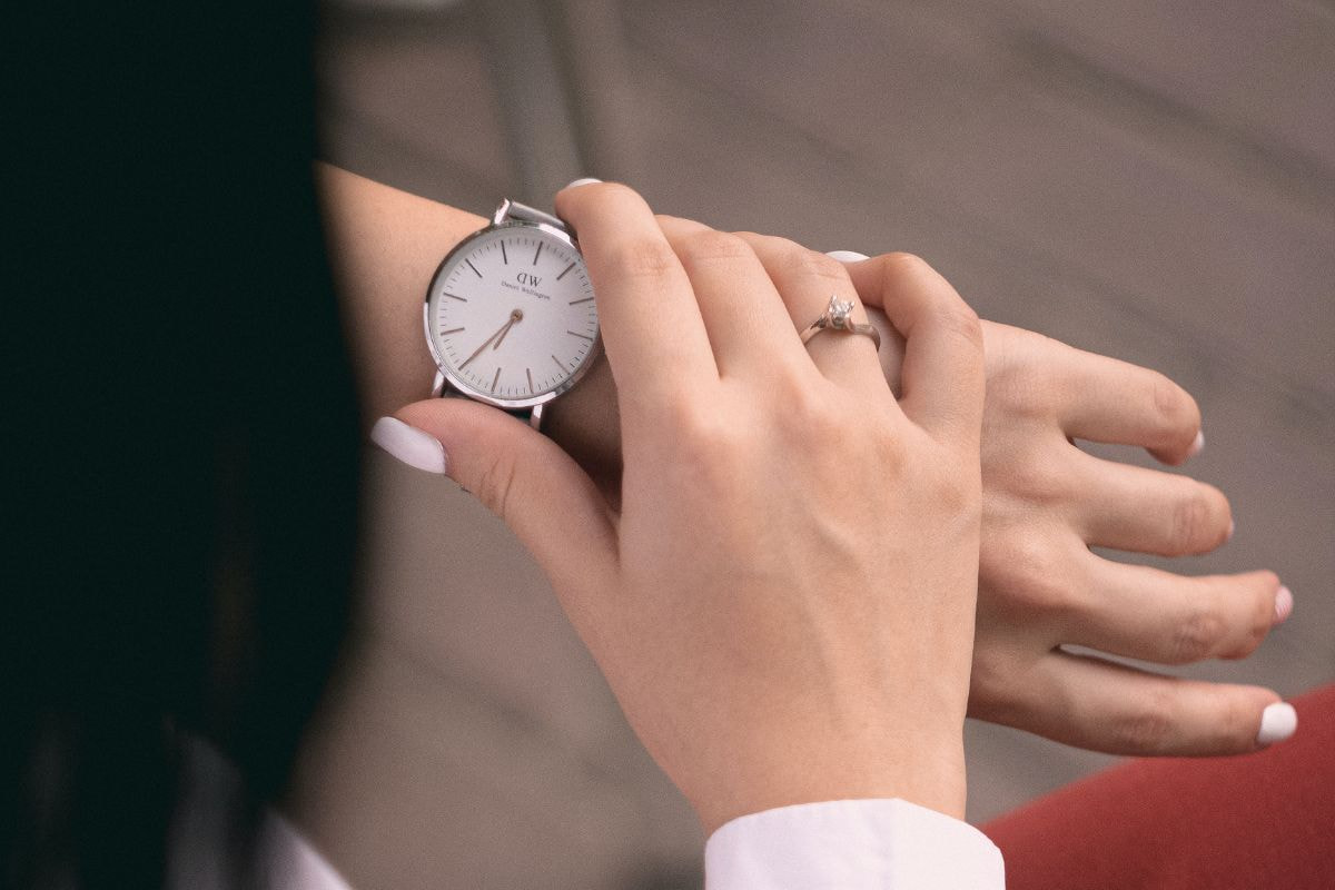 Woman checking the time on her wrist watch