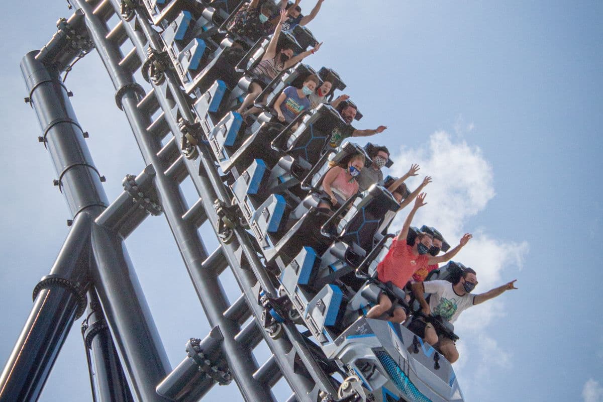 People riding the Jurassic World VelociCoaster at Universal Studios Orlando, Florida