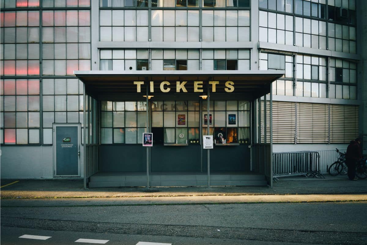 Storefront of a ticket sales office shot from across the street