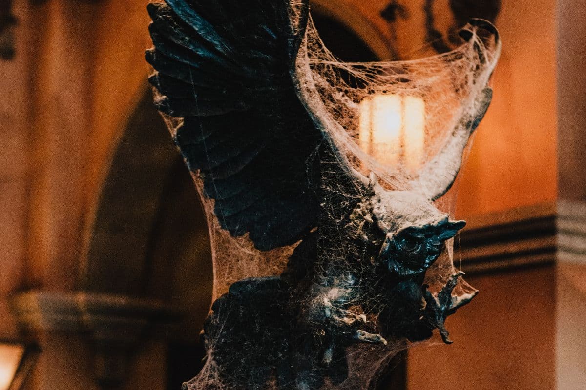 Owl statue covered in cobwebs inside the Twilight Zone Tower of Terror