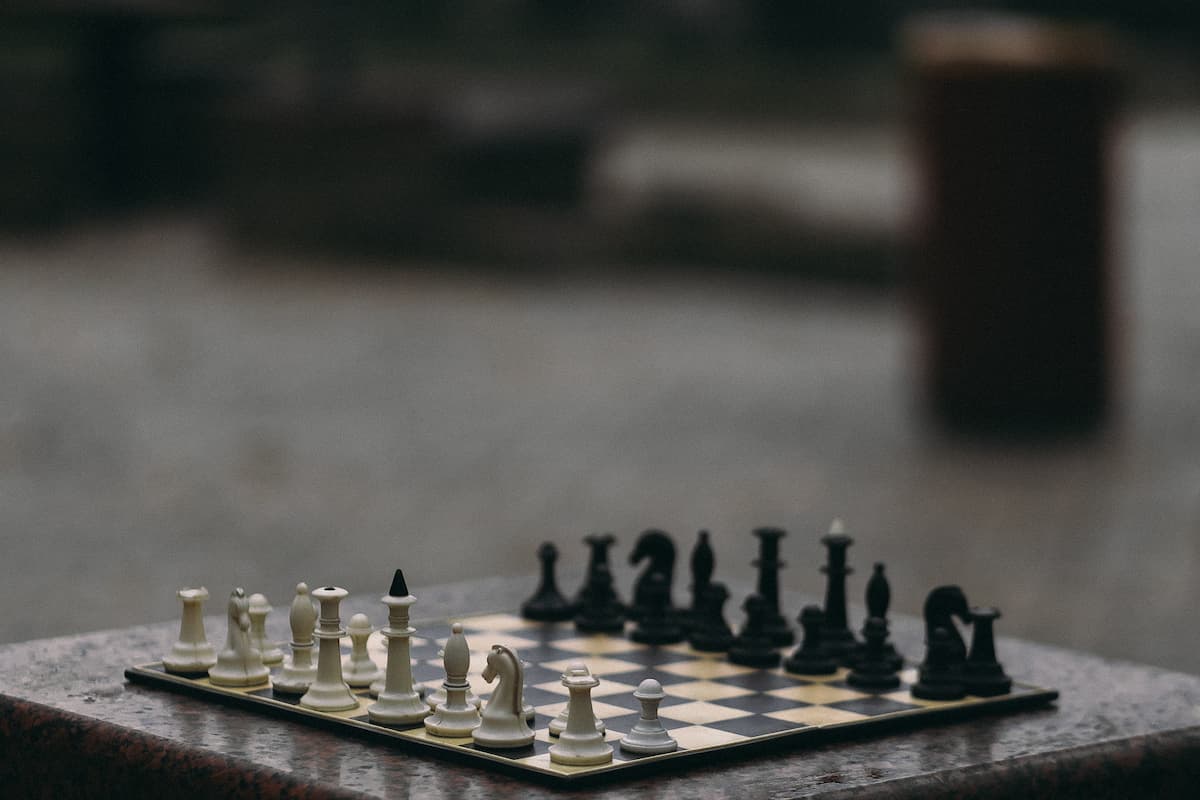 A photo of chess with a blurred background. 