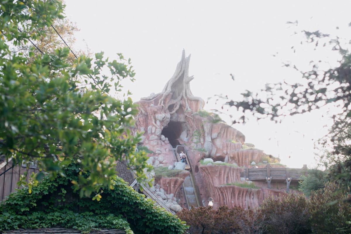 View from a distance showing people riding Splash Mountain. 