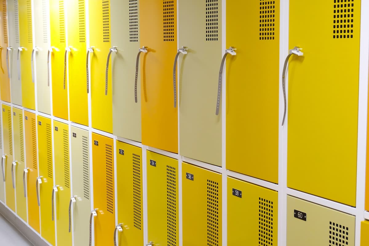 Close-up photo of yellow lockers. 