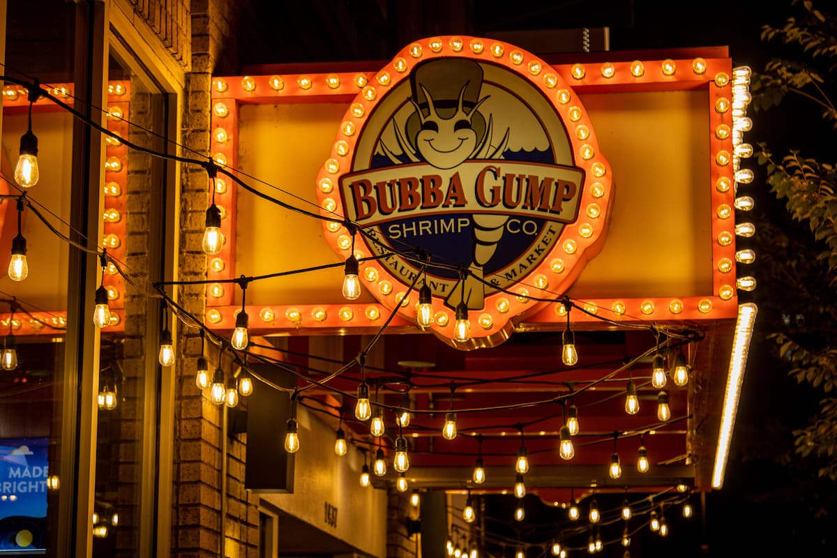 Bubba Gump Shrimp Co. sign with the lights on.