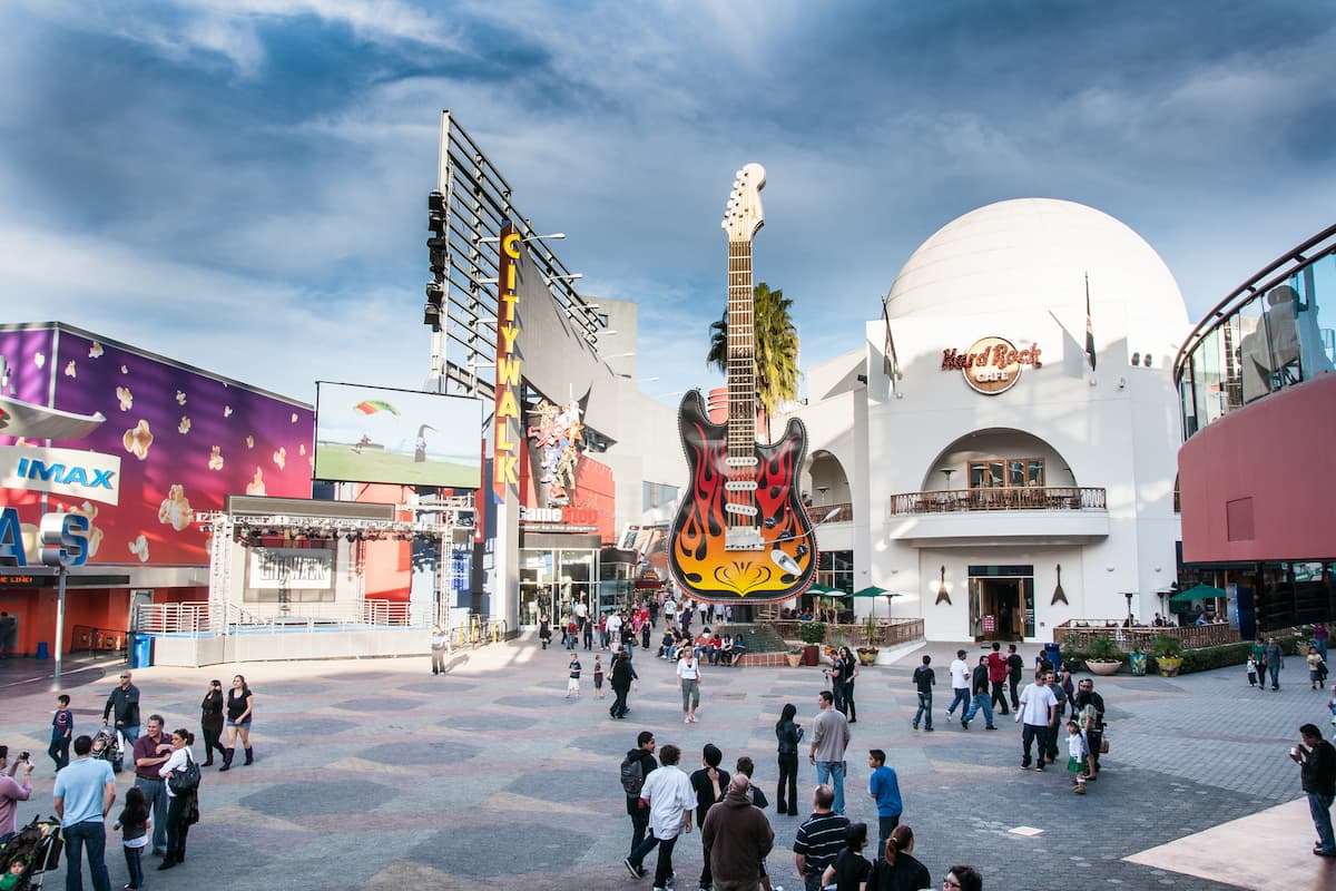 People walking along the CityWalk in Universal Orlando.